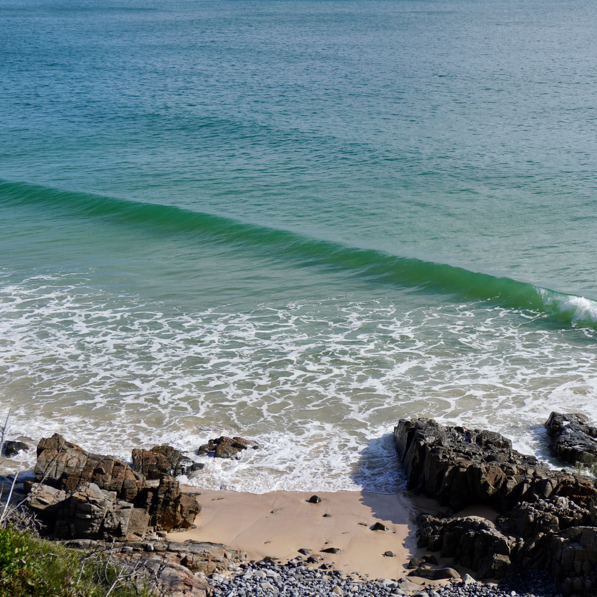 A wave rolling, taken from Tea Tree bay in Noosa Heads.